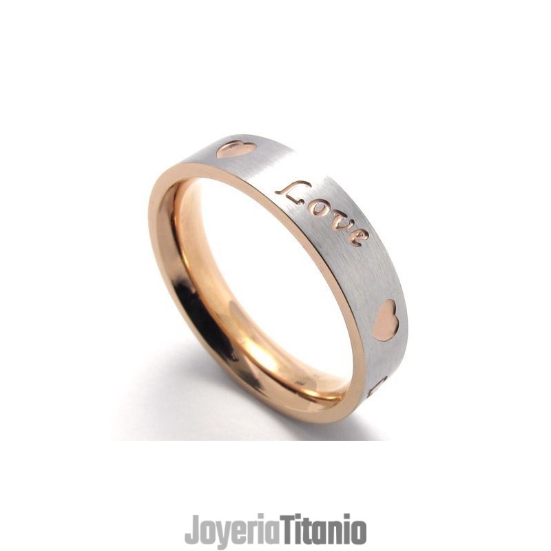 Anillo De Titanio Con Forma Elegante Y Brillo De Color Que Le Otorga Una Larga Reputación. Anillo De Titanio Con Forma Elegante Y Brillo De Color Que Le Otorga Una Larga Reputación.