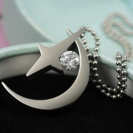 Colgante De Titanio Con Luna Y Estrella Y Circonitas
