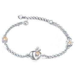 Pulsera De Titanio Con Baño De Platino Y Diamantes En Forma De Manzana Para Mujer.