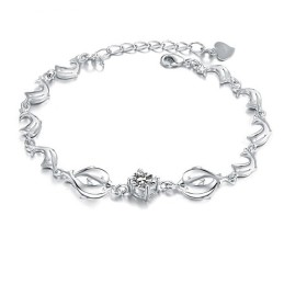 Pulsera De Titanio Con Baño De Platino Y Diamantes De Calidad Confiable Con Forma De Delfín Para Mujer.