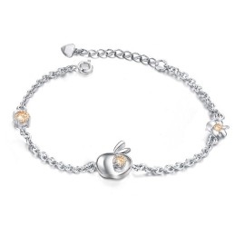 Pulsera De Titanio Con Baño De Platino Y Diamantes En Forma De Manzana Para Mujer.