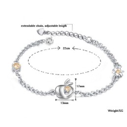 Pulsera De Titanio Con Baño De Platino Y Diamantes En Forma De Manzana Para Mujer.